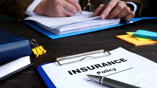 Insurance policy and agent filing in documents.