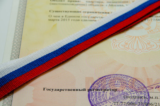 Moscow / Russia-May 2020: Russian tape is written against the background of the signature and stamp on the state document. 
