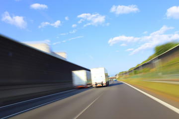 Speeding truck on the highway, motion blur