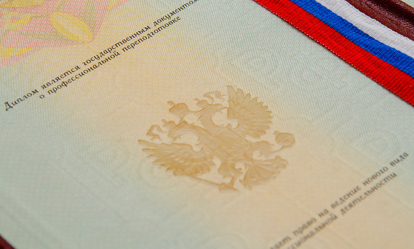 Moscow / Russia-May 2020: Graduate diploma and Russian tape. 