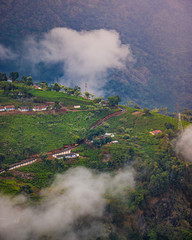 hill station village and road between clouds, beautiful landscape view