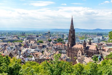Fototapeta na wymiar Aerial view on Freiburger Munster Cathedral church. Freiburg im Breisgau, Baden-Wurttemberg, Germany