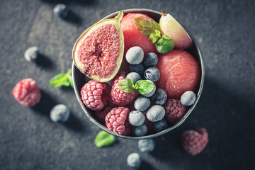 Top down view of ice cream sorbet on dark table