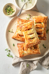 Delicious puff pastry with sausage and thyme