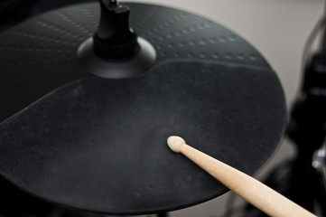 Closeup of a modern elecgtronic drum in black color.