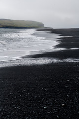 Atlantic landscape. Black sand beach in Iceland.