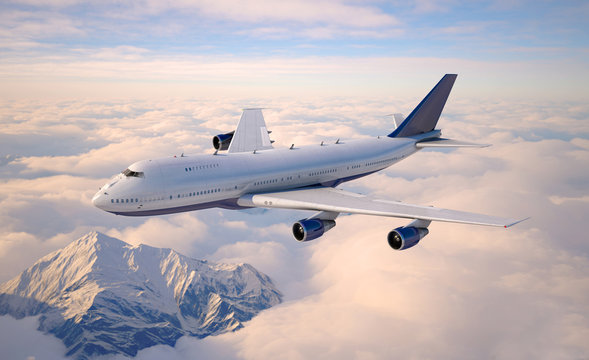 Passenger aircraft flying above the clouds.