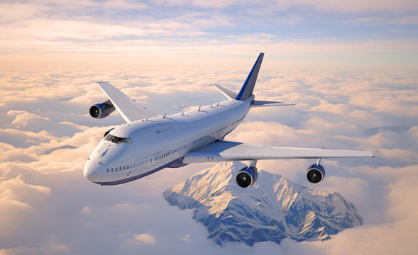 Passenger aircraft flying above the clouds.