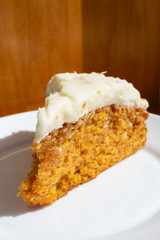Simple Homemade Carrot Cake on a White Plate