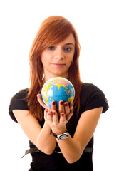 Cheerful young woman and globe, isolated on white background