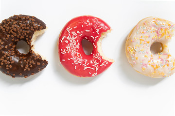 Appetizing sweet donut on a white background. Top view