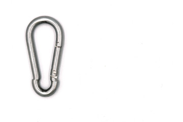 A carabiner or karabiner is a specialized type of shackle, a metal loop with a spring-loaded gate used to quickly and reversibly connect components, most notably in safety-critical systems.