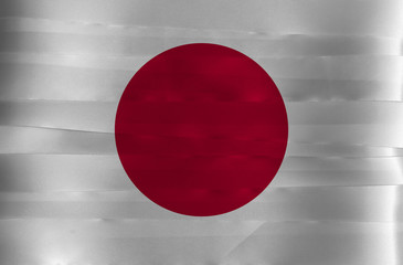 Colorful ribbon as Japan national flag, red sun on white.