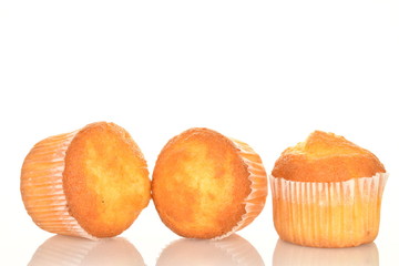 Tasty sweet muffins, close-up, on a white background.