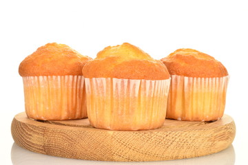 Tasty sweet muffins, close-up, on a white background.