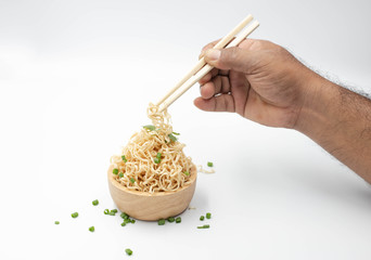 Instant Noodles.Dry the sticks in a wooden bowl.