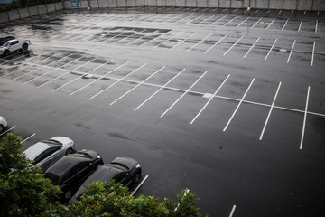 Chon buri, Thailand, April 26, 2020. Cars in the parking lot view from above. Rainy in the parking lot. © Nanthicha Khamphumee