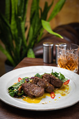 Grilled marbled meat steak in restaurant  