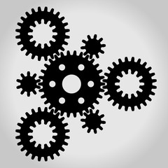 Black silhouette mechanical gears & cogwheel set, small and large, arranged in a triangle. Vector illustration.