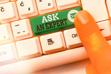 Word writing text Ask An Expert. Business photo showcasing consult someone who has skill about...