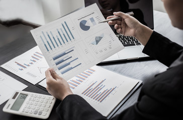 Head of marketing has analyzed the financial income graph of the company in order to develop the structure of the company to be ready for the economy in the future. Financial results analysis concept.