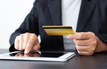 women use Tablet to register online purchases using credit card payments, Convenience in the world of technology and the internet, Shopping online and banking online concept.