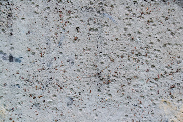 Texture of old tattered wall or gray concrete fence