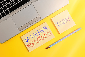 Text sign showing Do You Know Your Customers question. Business photo text asking to identify a customer s is nature Trendy silver open laptop square sticky notepads marker colored background