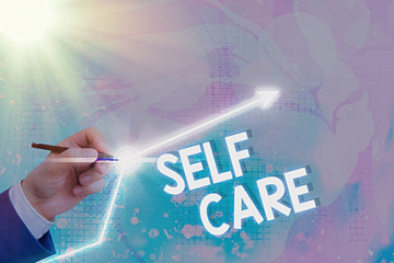 Text sign showing Self Care. Business photo text the practice of taking action to improve one s is...