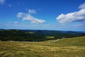 Obraz premium Beautiful view from Le Hohneck mountain over the hilly landscape of the Vosges