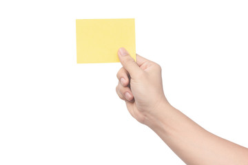 Hand holding yellow paper isolated on white with clipping path.