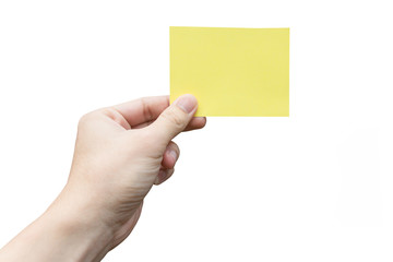Fototapeta premium Hand holding yellow paper isolated on white with clipping path.