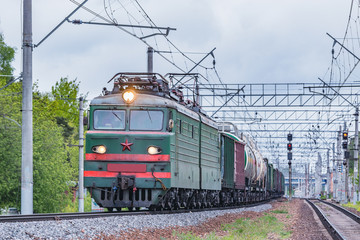 Obraz premium Freight train moves at evening summer time.