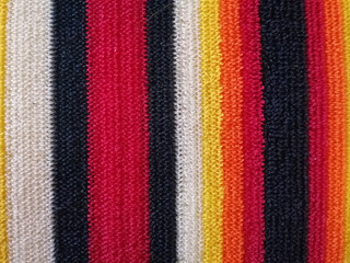 Multicolored cross pattern of nylon fabric.