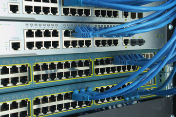 Closed data center Internet provider. Cable and switch connections. High speed internet network....