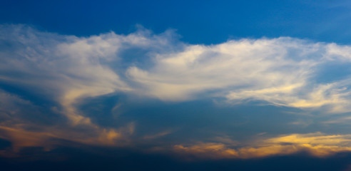 Naklejka na ściany i meble Blue sky with beautiful clouds in the evening