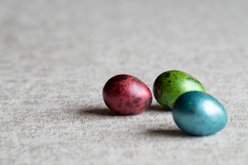 colorful painted quail egg. Preparing for Easter. Colorful eggs. Beautiful multi-colored jewelry