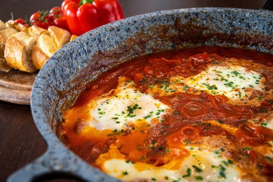 shakshuka middle east traditional breakfast meal with eggs in a pan