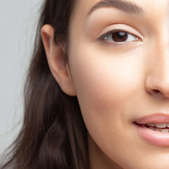 Fototapeta premium Portrait of young beautiful woman with clean perfect skin