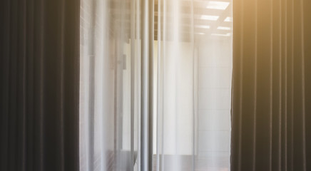 white curtain with a window