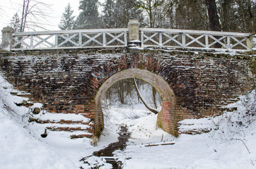 View of old stone bridge winter background
