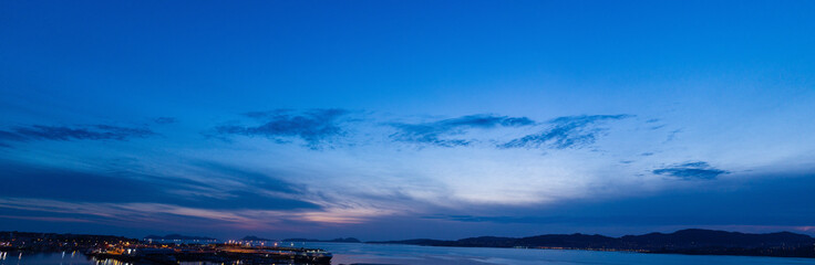 Panoramic night sky with some clouds