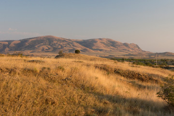 Fototapeta na wymiar View of a Crimean steppy at sunset. Sun Valley, Crimea.