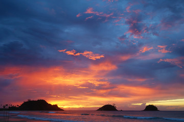 Fototapeta na wymiar Sunset on the beach with beautiful sky. Sunrise at the beach