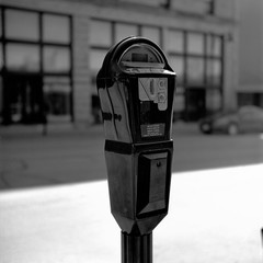Parking meter on the street In Small Town Medium Format Black and White film