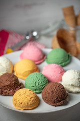 assorted scoopes of ice cream on plate