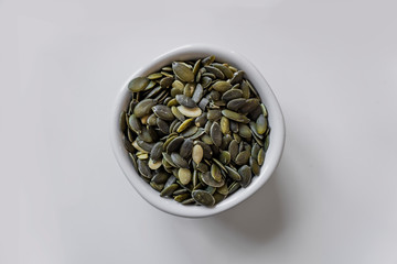 sunflower seeds isolated in white pot
