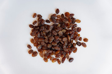 dry raisins isolated from dry fruits pot