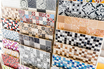 Collection of colorful tiles. Variety of tiles in an interior shop.