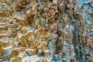 Abstract background from toned mountains texture, volcanic basalt as in Iceland. Bright colorful...